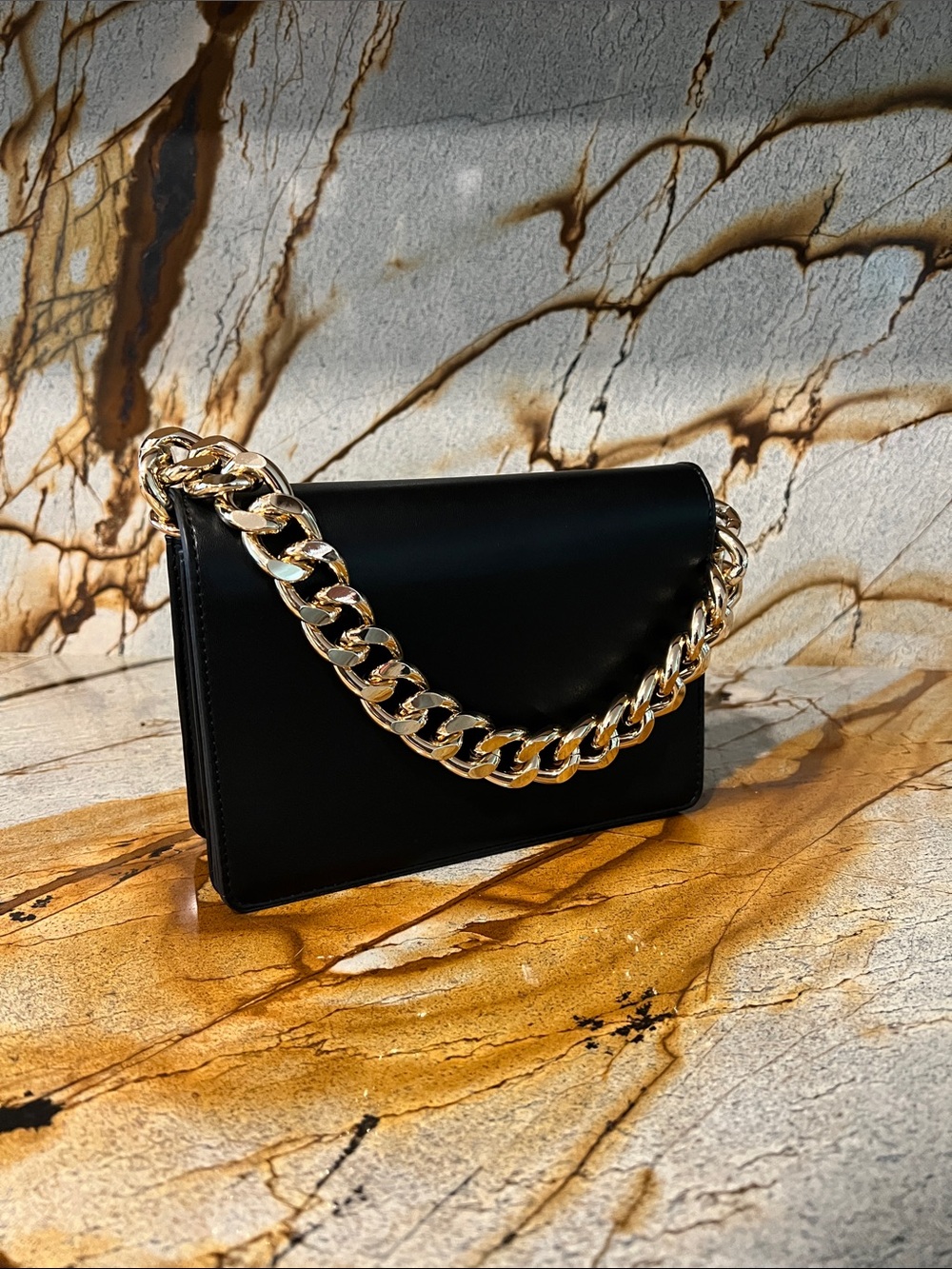 Evening handbag with large metal chain